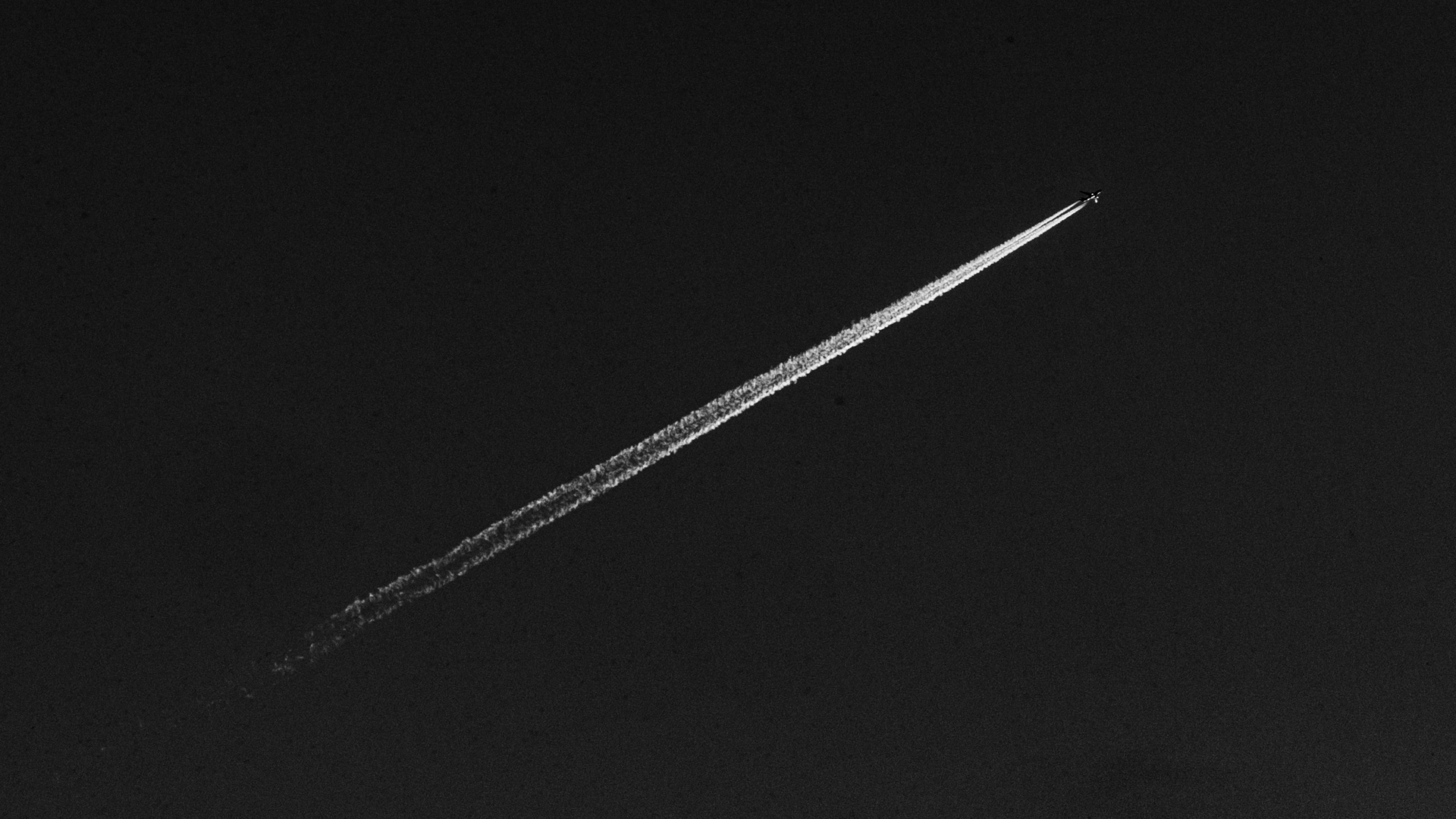 Jet in monochrome sky